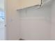 Walk-in closet with ample storage space and a simple, clean design at 728 N Bently St, Watkins, CO 80137