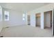 Spacious main bedroom with neutral carpet, recessed lighting, and an ensuite bathroom at 728 N Bently St, Watkins, CO 80137
