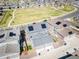 Property aerial view showing outdoor space and proximity to a large grassy park at 17614 Cherokee St, Broomfield, CO 80023