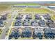 An aerial view of the property in a community near a park, school and commercial buildings at 17614 Cherokee St, Broomfield, CO 80023
