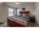 Cozy bedroom with great natural light, warm tones, and comfortable furnishings at 17614 Cherokee St, Broomfield, CO 80023