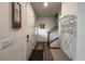 Welcoming entryway with coat rack, artwork, and wood-look floors at 17614 Cherokee St, Broomfield, CO 80023