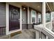 Inviting porch with a wreath on the door and seating area at 17614 Cherokee St, Broomfield, CO 80023