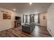 Bright living room featuring a cozy fireplace and comfortable seating at 17614 Cherokee St, Broomfield, CO 80023
