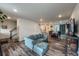 Spacious open-concept living area with modern finishes and seamless flow at 17614 Cherokee St, Broomfield, CO 80023