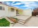 Spacious backyard with a concrete patio, fenced yard, and ample space for gardening at 12116 N Fairfax St, Thornton, CO 80241