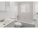 Clean bathroom with a shower over the tub, a new toilet and a sink with vanity at 12116 N Fairfax St, Thornton, CO 80241