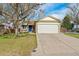 Charming single-Gathering home featuring a two-car garage, stone accents, and a well-manicured lawn at 12116 N Fairfax St, Thornton, CO 80241