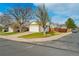Exterior view of home featuring a two-car garage, well-maintained lawn and convenient street access at 12116 N Fairfax St, Thornton, CO 80241