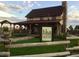 Charming Fika Coffee House featuring rustic architecture, outdoor seating, and inviting signage on a grassy lawn at 21658 E Tallkid Ave, Parker, CO 80138