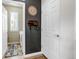 Hallway landing with a laundry room including a laundry room rug at 21658 E Tallkid Ave, Parker, CO 80138