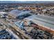 Aerial view showcasing the property's surrounding area, including a large building and airplane at 7777 E 1St Pl # 110, Denver, CO 80230