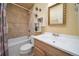 Clean bathroom with a bathtub and updated vanity at 7777 E 1St Pl # 110, Denver, CO 80230