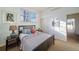 Bright bedroom with ample natural light and a double bed at 7777 E 1St Pl # 110, Denver, CO 80230