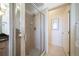 Clean and modern shower with glass enclosure and neutral tile at 7777 E 1St Pl # 110, Denver, CO 80230