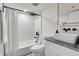 Modern bathroom featuring a stylish vanity, a sleek shower, and elegant fixtures at 2827 Bellaire St, Denver, CO 80207