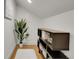 Hallway with a built-in bookshelf and modern decor at 2827 Bellaire St, Denver, CO 80207