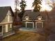 Spacious backyard featuring a detached garage and additional parking with basketball hoop at 1433 Olive St, Denver, CO 80220