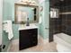 Charming bathroom with classic fixtures and a serene ambiance at 1433 Olive St, Denver, CO 80220
