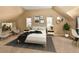 Tranquil bedroom with neutral tones, plush carpeting, and plenty of natural light at 1433 Olive St, Denver, CO 80220