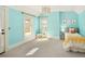 Bright and airy bedroom with playful wall color and ample natural light at 1433 Olive St, Denver, CO 80220