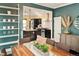 Open concept dining room with sight lines into a modern kitchen at 1433 Olive St, Denver, CO 80220