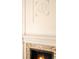 Elegant fireplace with decorative mantle and tiled hearth, enhancing the room's ambiance at 1433 Olive St, Denver, CO 80220