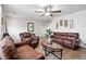 Spacious living room showcasing a modern design, neutral color scheme, and ample natural light at 1419 Swan Ave, Brighton, CO 80601