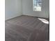 Comfortable bedroom featuring plush carpeting and a window to provide natural light and ventilation at 21966 E 39Th Pl, Aurora, CO 80019