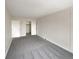 A basic bedroom with neutral carpet, paint, and closet at 9976 Appletree Pl, Thornton, CO 80260