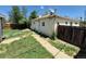 Single story home features a fenced yard at 1303 Havana St, Aurora, CO 80010