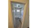 A view into the bathroom featuring a bath tub, window, and toilet at 1303 Havana St, Aurora, CO 80010