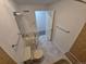 Bathroom features shower and tub combination, toilet and vanity at 1303 Havana St, Aurora, CO 80010