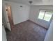 Standard bedroom with window view and neutral carpet at 1303 Havana St, Aurora, CO 80010