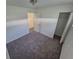Standard bedroom with neutral carpet, standard closet and hall access at 1303 Havana St, Aurora, CO 80010