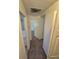 Hallway that includes carpet and doors at 1303 Havana St, Aurora, CO 80010