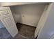The laundry room featuring bi-fold doors at 1303 Havana St, Aurora, CO 80010
