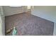 The living room offers generous space and neutral carpeting, creating a cozy and inviting atmosphere at 1303 Havana St, Aurora, CO 80010