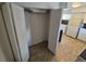 A view of the pantry featuring bi-fold doors and tile flooring at 1303 Havana St, Aurora, CO 80010