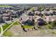 Scenic aerial view showcasing the property's spacious yard and tranquil surroundings in a lovely neighborhood at 360 Basilwood Way, Highlands Ranch, CO 80126