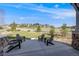 Scenic backyard with Adirondack chairs offers peaceful views and a great space for relaxation at 360 Basilwood Way, Highlands Ranch, CO 80126