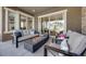 Inviting patio features a modern fire pit and comfortable seating, perfect for outdoor entertaining at 360 Basilwood Way, Highlands Ranch, CO 80126
