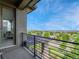 Balcony view overlooking a well maintained park and neighborhood, offering a peaceful outdoor space at 9395 Night Star Pl, Lone Tree, CO 80124