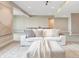 Spacious basement featuring a large seating area and ping pong table, perfect for entertaining guests at 9395 Night Star Pl, Lone Tree, CO 80124