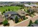Luxury homes situated across a green neighborhood park, with views of the Denver Tech Center at 9395 Night Star Pl, Lone Tree, CO 80124