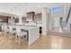 Spacious kitchen with a large island, stainless steel appliances, and modern finishes at 9395 Night Star Pl, Lone Tree, CO 80124
