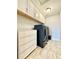 Modern laundry room with upper cabinets, a white dresser, and dark front-loading washer and dryer at 17955 E 107Th Pl, Commerce City, CO 80022