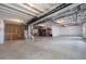 Spacious unfinished basement awaiting customization, featuring open layout and utility hookups at 751 Green Mountain Dr, Erie, CO 80516