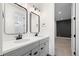 Bathroom featuring double sinks, modern fixtures, and a clean, bright design at 751 Green Mountain Dr, Erie, CO 80516