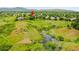 Idyllic setting of a home situated near a creek and green space, offering a tranquil escape surrounded by nature at 2252 S Queen St, Lakewood, CO 80227